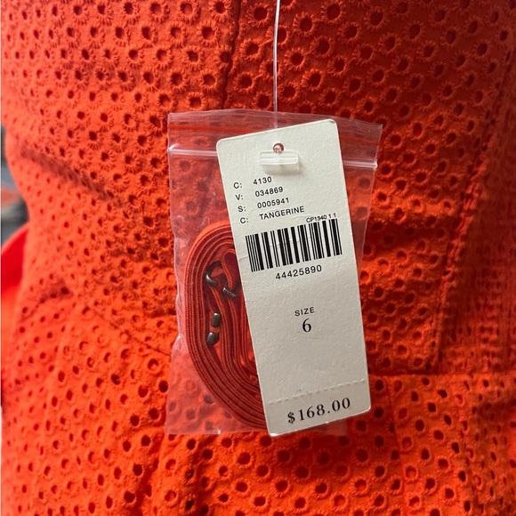 NWT size 6 Anthropologie orange eyelet jumpsuit with bow and POCKETS - Picture 4 of 4